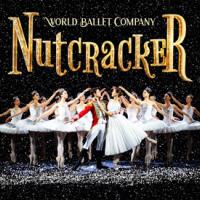 A black snowy background of 6 ballerinas making a V with another male and female dancer center, World Ballet Company NUTCRACKER 