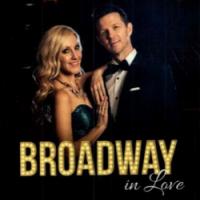 Blonde lady and Dark hair male with BROADWAY in love written on the bottom