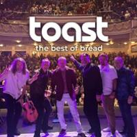 6 band members on a stage with backs to audience "Toast, the best of Bread"