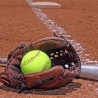 Softball in Mitt with Baseball Bat