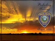 Sunset Photo with GFPD patch with saying Protecting and serving since 1888