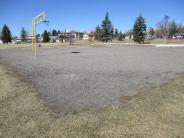 Before Photo - Replacing Basketball Court to Include Sidewalk
