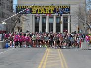 Runners line up at the start of the Ice Breaker Road Race. 