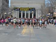 Runners take off as the race begins. 