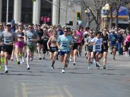Runners take off as the race begins. 