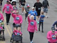 Several participants walking during the race