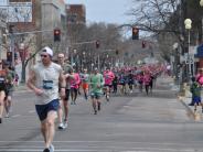 Hundreds of runners are shown as they make their way through the race