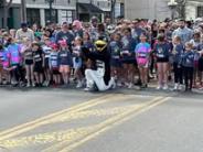 Pacer Mascot and Runners at start of 2025 Ice breaker