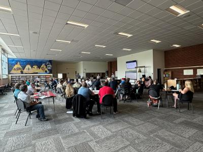 Community sitting in a class setting together