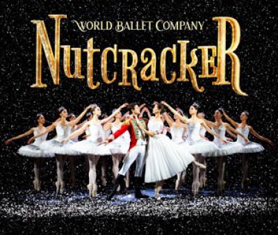 A black snowy background of 6 ballerinas making a V with another male and female dancer center, World Ballet Company NUTCRACKER 
