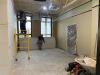 Workers working on the west end of the HR remodel space